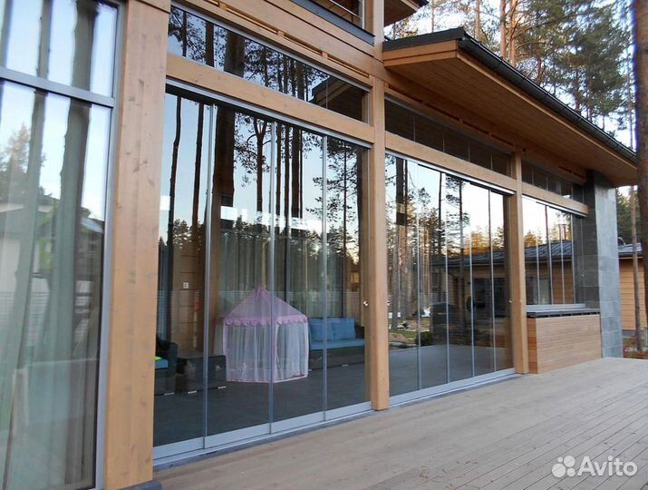 Безрамное раздвижное остекление