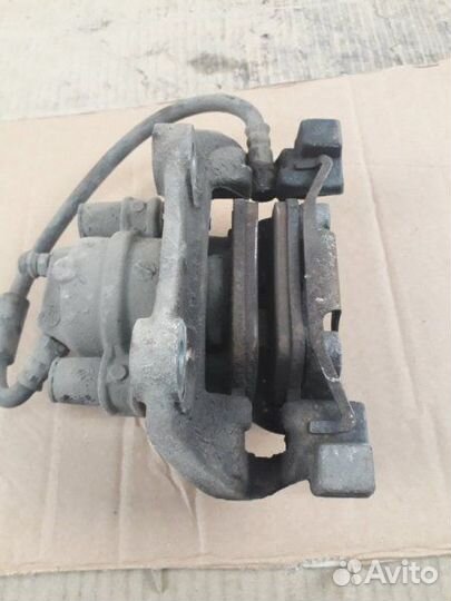 Суппорт тормозной задний левый Mercedes-Benz