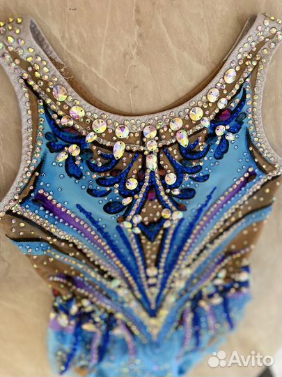 Костюмы для гимнастики и фигурного катания