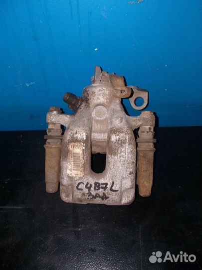 Суппорт тормозной задний левый Ситроен С4 II