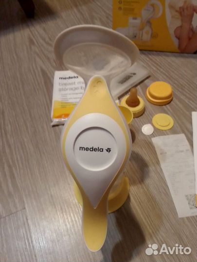 Молокоотсос medela ручной