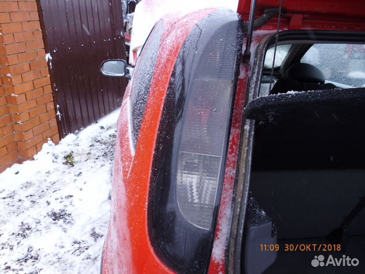 Фонарь задний левый Опель Корса С, купе