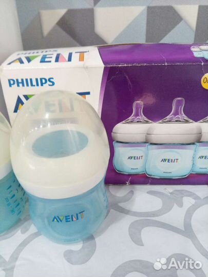 Бутылочки для кормления и стерилизатор