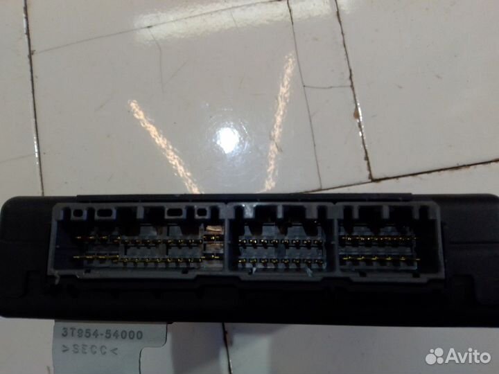 Электронный блок (Kia Quoris)