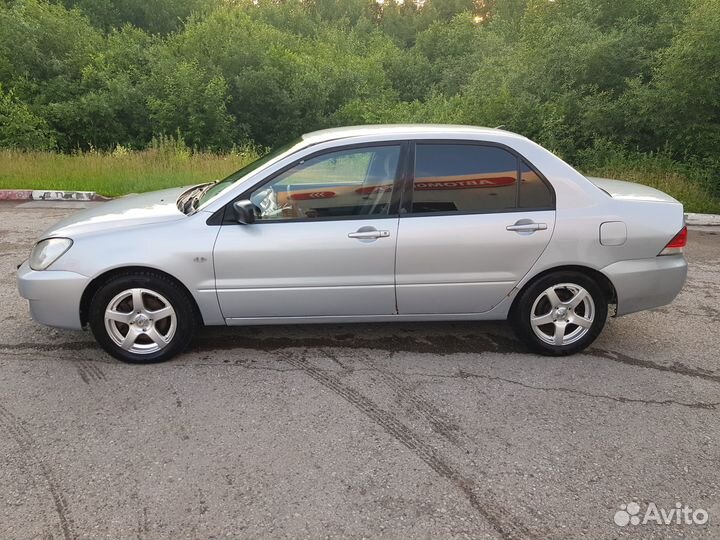 Mitsubishi Lancer 1.3 МТ, 2004, 323 000 км