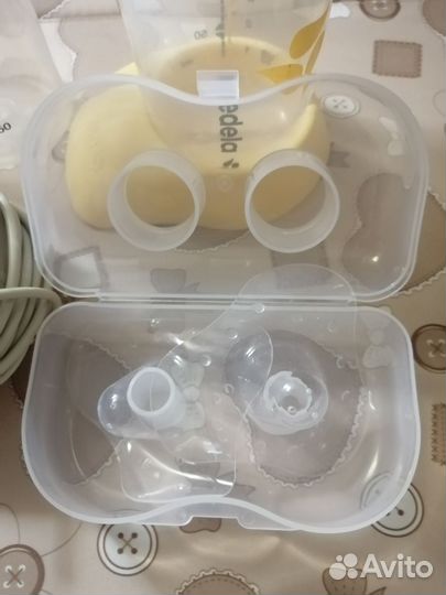 Молокоотсос medela