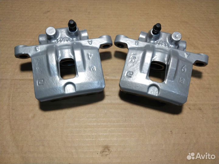 Задний суппорт Мицубиси Лансер 10