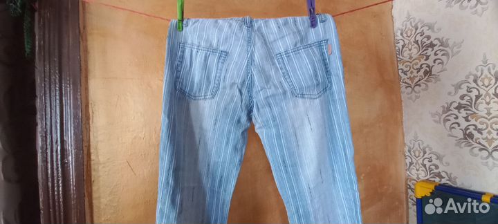 Джинсы клеш