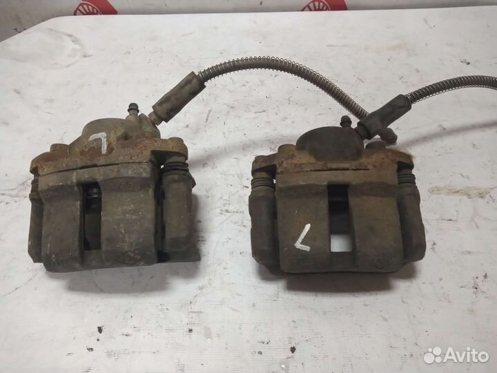 LADA largus суппорт передний левый 7701207958