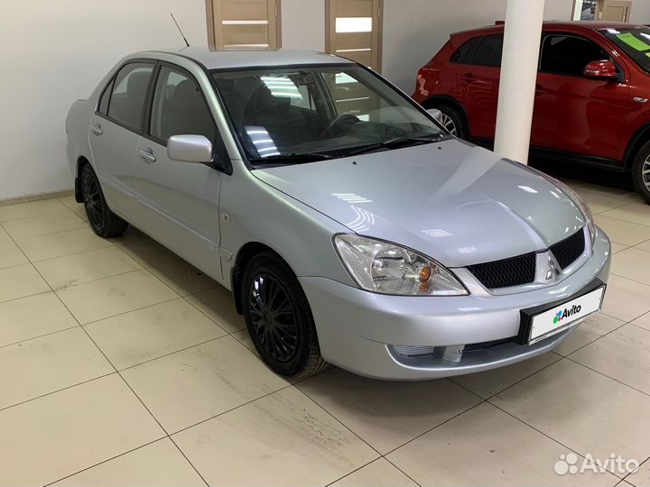 Mitsubishi Lancer 1.6 AT, 2009, 140 650 км