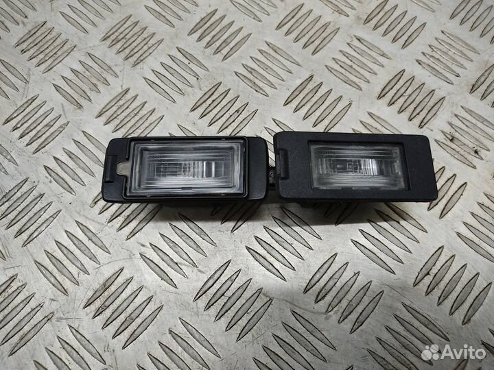 Подсветка номера Opel Astra J 2011 13590043