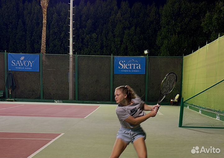 Тренер по большому теннису