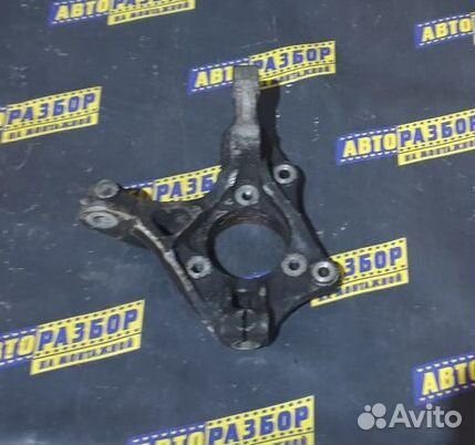 Поворотный кулак левый Опель Астра J