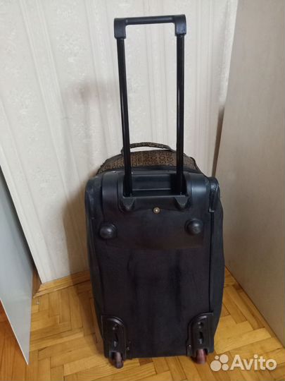Сумка дорожная на колесах с выдвижной ручкой