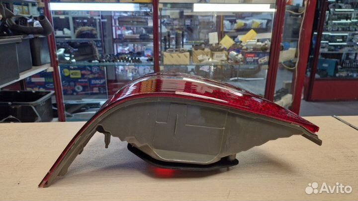 Фонарь задний задний левый Toyota Corolla NZE121