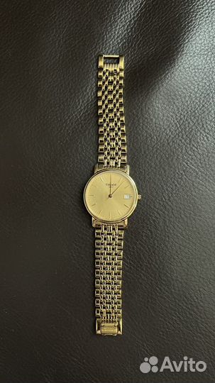 Золотые часы tissot