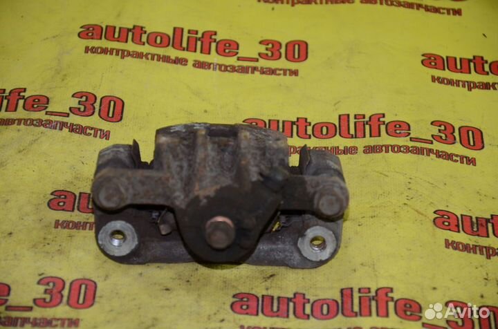 Суппорт тормозной задний левый Kia Soul