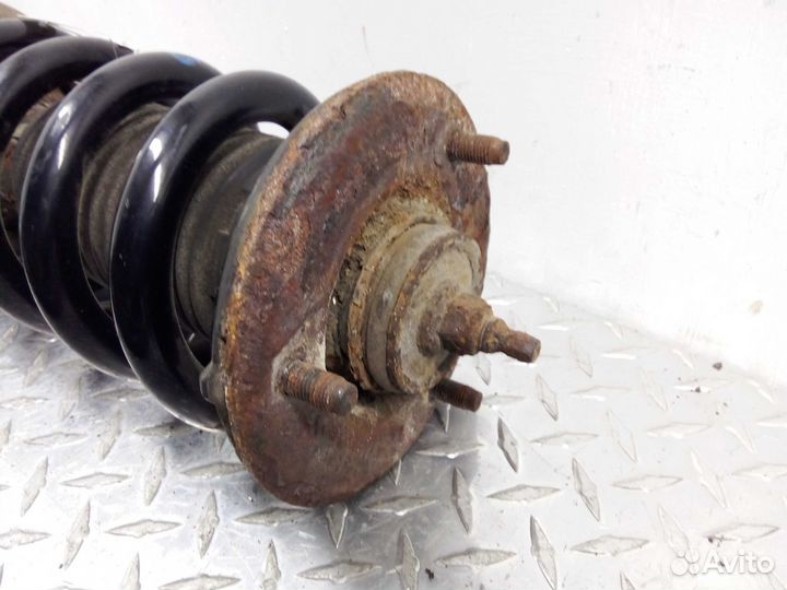 Амортизатор передний L Infiniti QX56 JA60 56110ZQ2