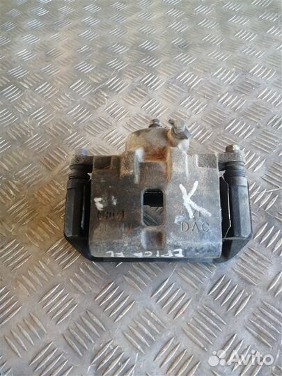 Суппорт тормозной передний левый Chevrolet Epica