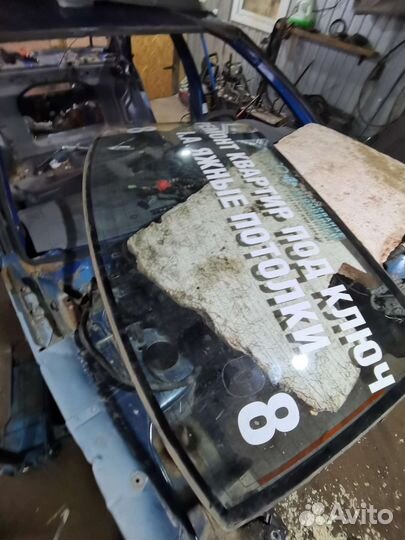 Стекло заднее Nissan almera N15