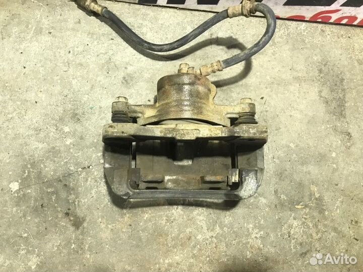 Суппорт тормозной передний правый Chevrolet