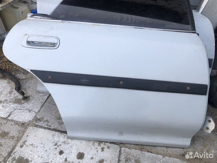 Дверь Toyota Corona exiv st180
