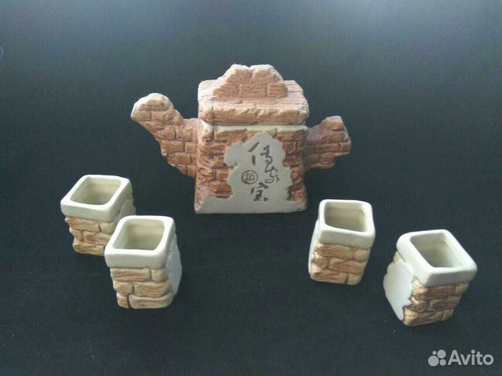 Статуэтка Будды и чайный набор из Китая