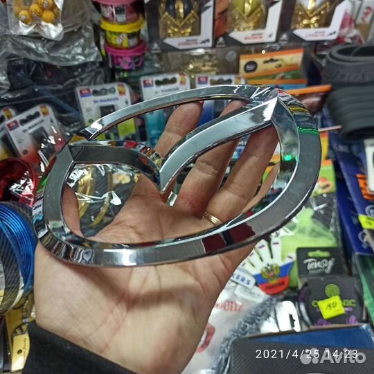 Эмблема Мазда