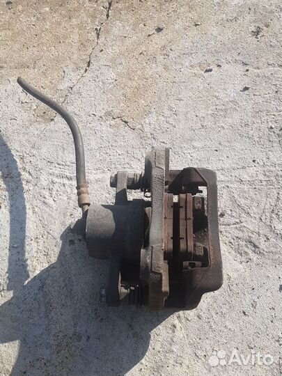 Суппорт задний левый KIA opirus