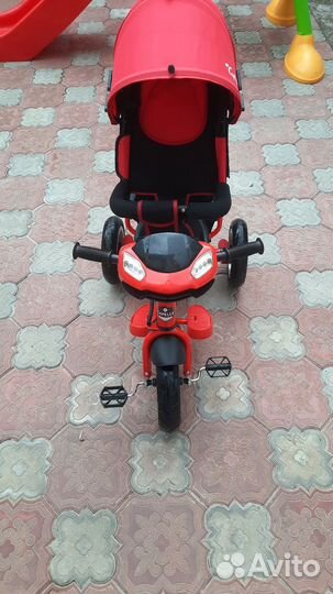 Трехколесный велосипед с ручкой