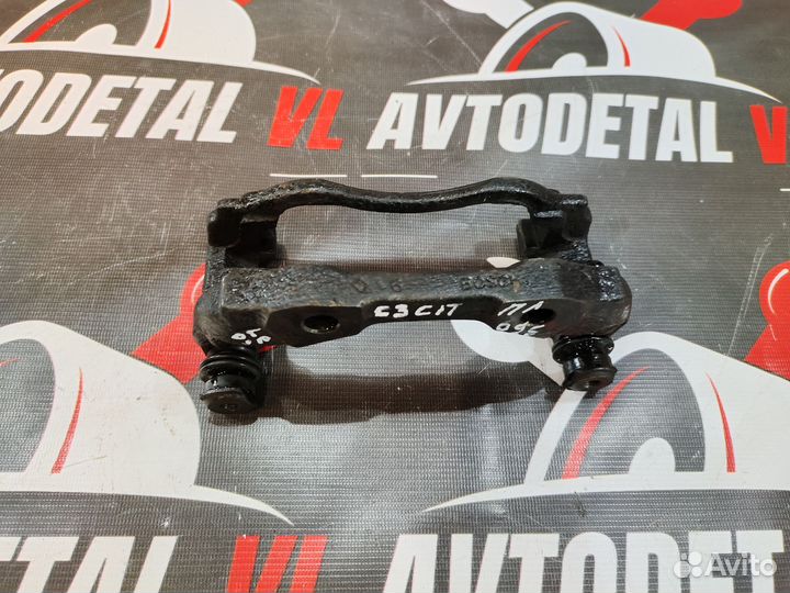 Скоба суппорта передняя левая Citroen c3