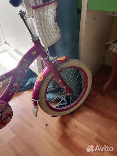 Продам детский велосипед с боковыми колесами