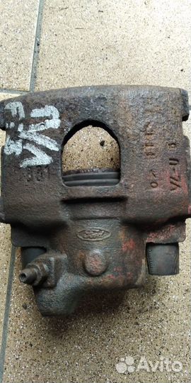 Суппорт тормозной Форд Фиеста мк 3