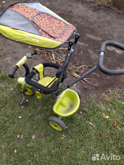 Трехколесный велосипед с ручкой