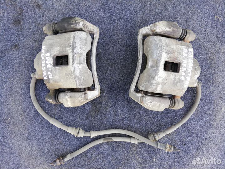 Суппорта передние Киа Спектра