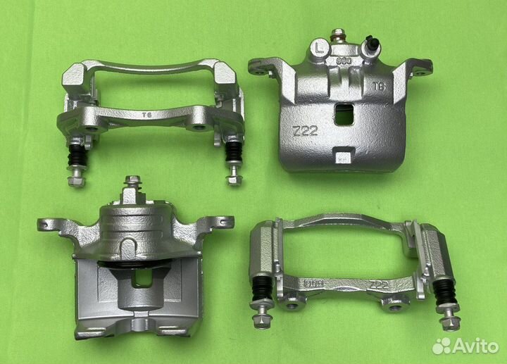 Nissan Cube тормозной суппорт