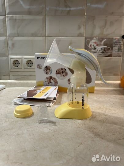 Молокоотсос medela ручной
