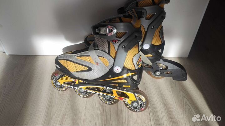 Роликовые коньки