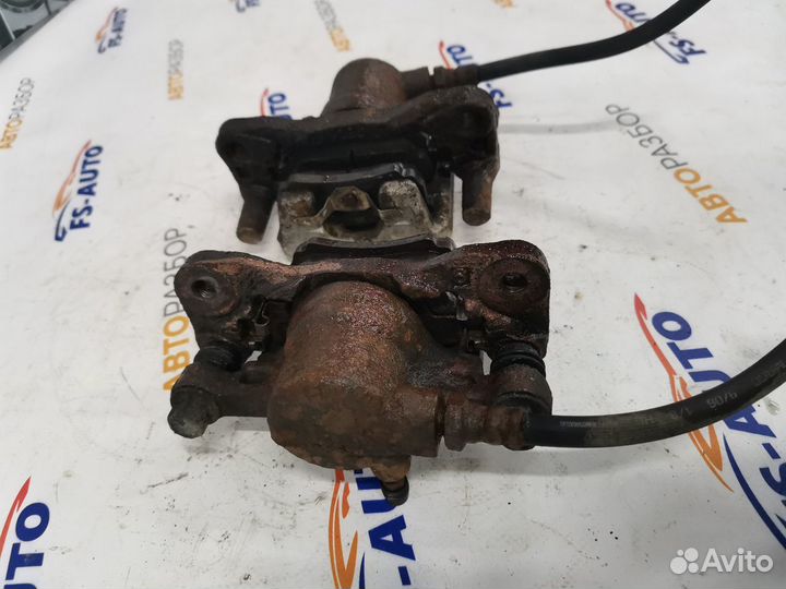 Задние тормозные суппорта Митсубиси Лансер 9