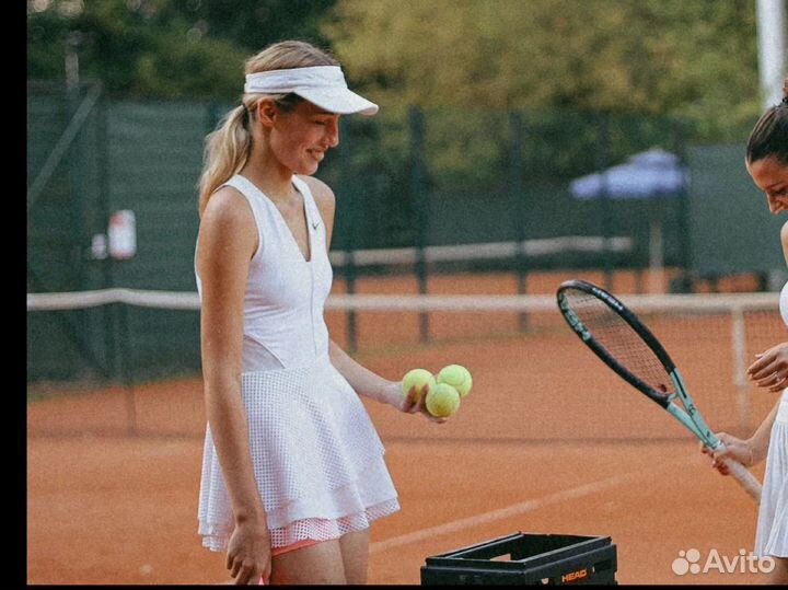 Тренер по большому теннису