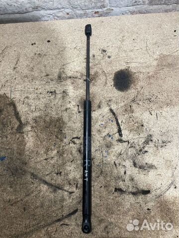 Амортизатор двери багажника Mitsubishi Outlander 2