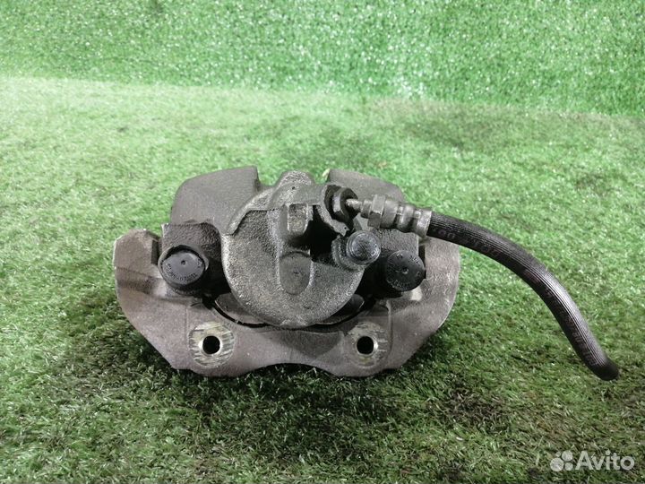 Суппорт тормозной передний правый Mazda Axela bkep