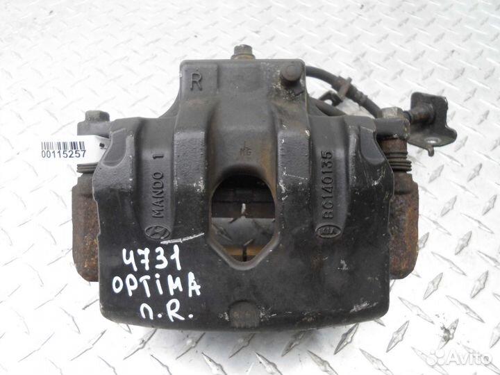 Суппорт передний правый Kia Optima 3 (TF) BC140135