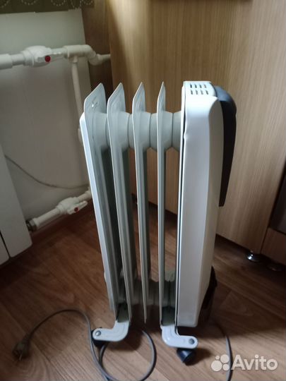 Масляный обогреватель delonghi