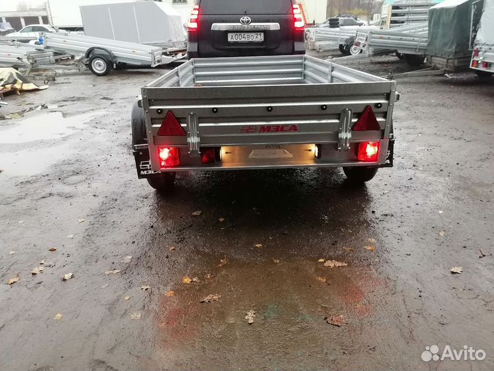 Двухосный прицеп 817730.022 с тентом 50 см