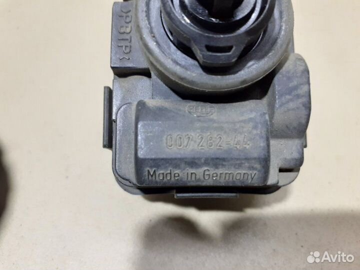 Моторчик корректора фары Mitsubishi Outlander