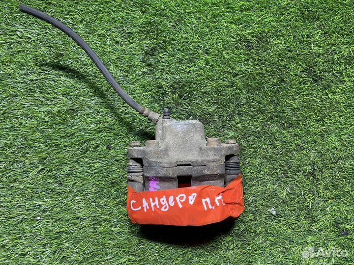 Суппорт тормозной передний правый Renault Sandero