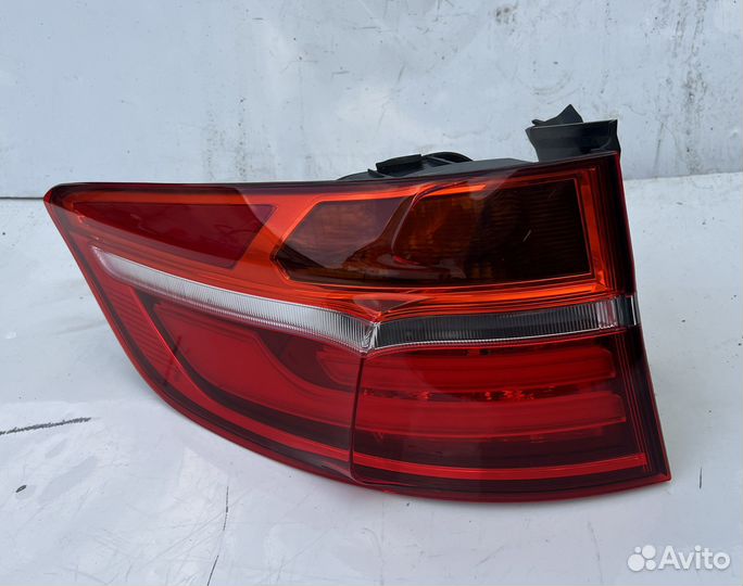 Фонарь задний 63217295001 BMW левый