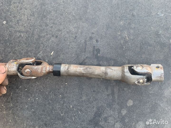 564001m000 вал рулевой