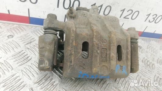 Суппорт тормозной передний правый mitsubishi outla